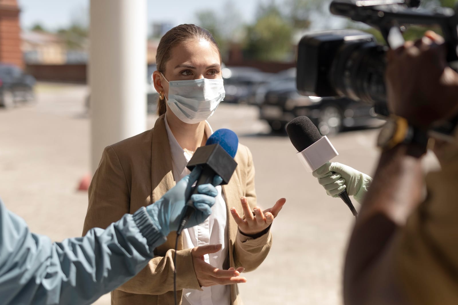 Reporter conducting an interview on location for a Quillwick story